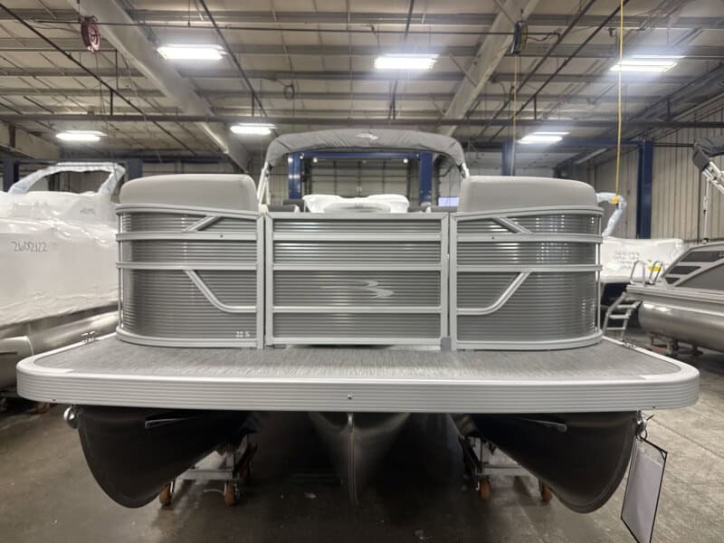 Modern Bennington 22 SSR pontoon boat displayed at Hall's Sport Center showroom.