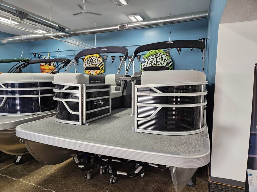 Bennington 22 SSR pontoon boat with sleek design and spacious deck.