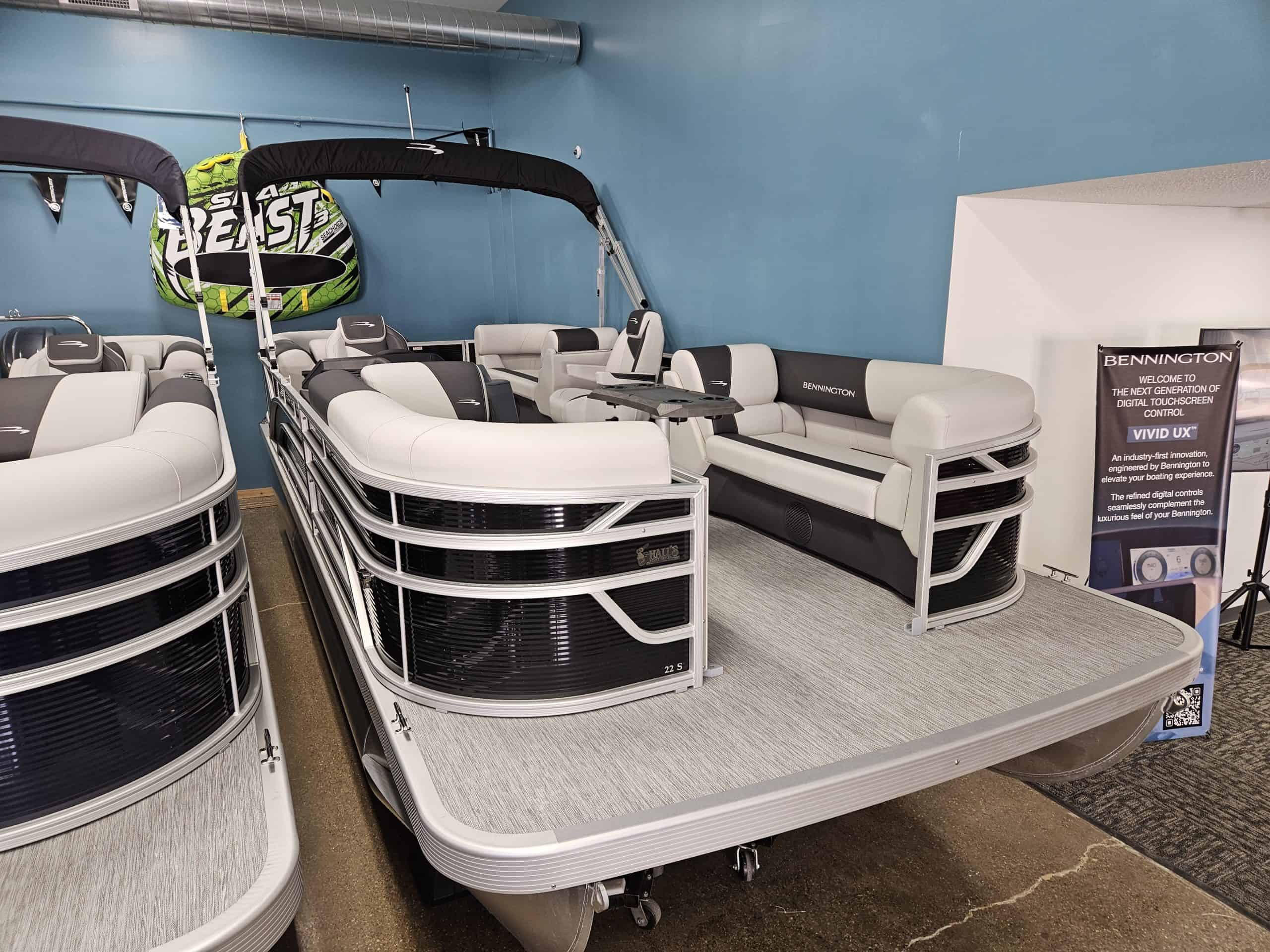 Bennington 22 SSR pontoon boat for sale at Hall's Sport Center. Perfect for family outings and water.