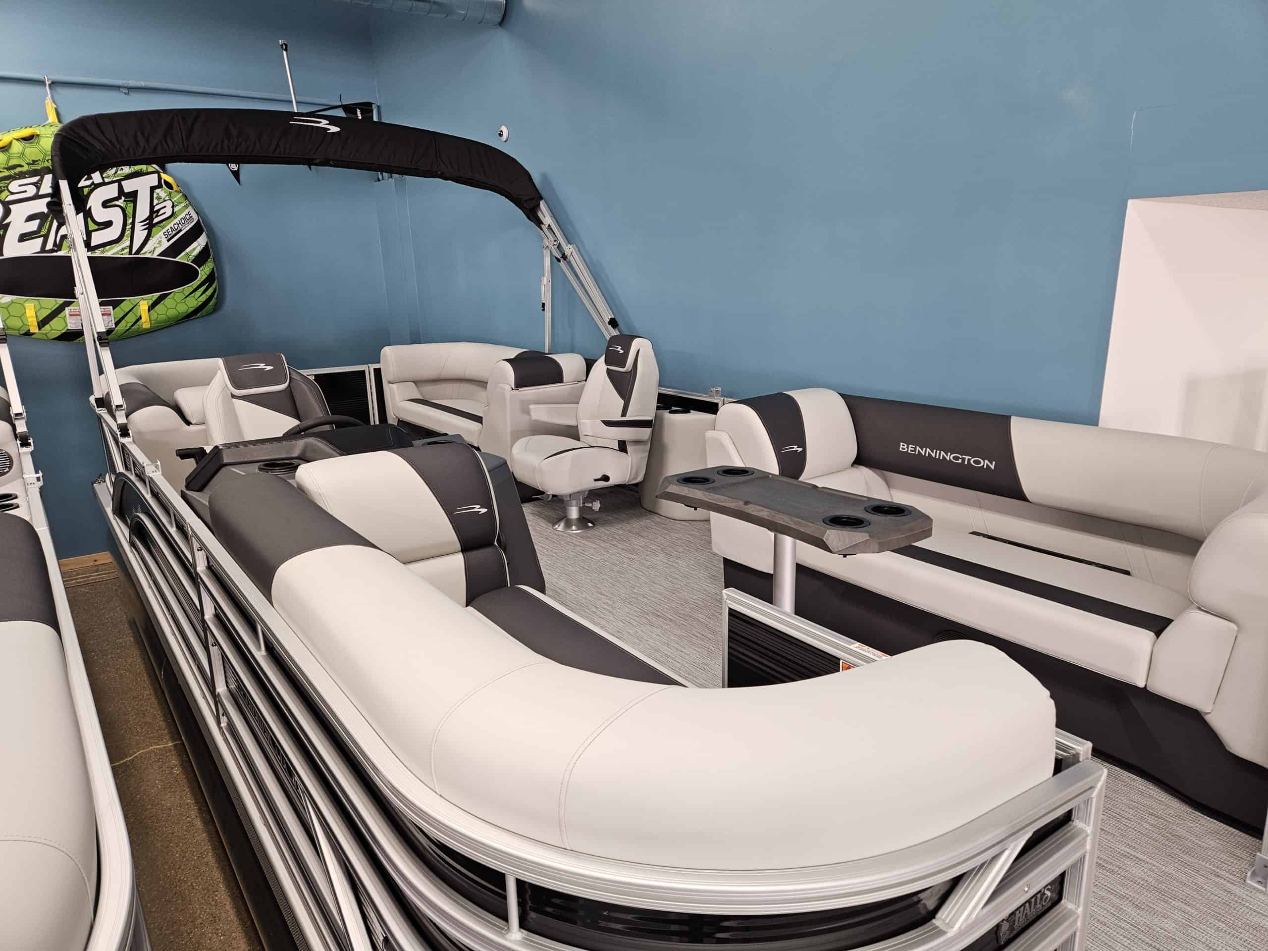 Bennington 22 SSR pontoon boat displayed at Hall's Sport Center. Perfect for family outings and wate.