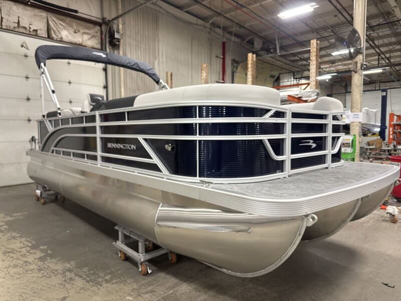 Bennington 22 SSR pontoon boat at Hall's Sport Center showroom.