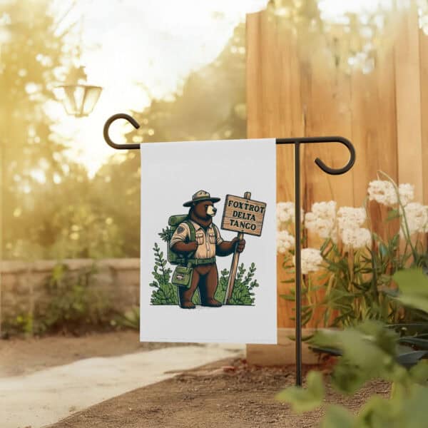 Foxtrot-Delta-Tango-Political-Garden-Banner,-Resist-Bear-Anti-Trump-Flags