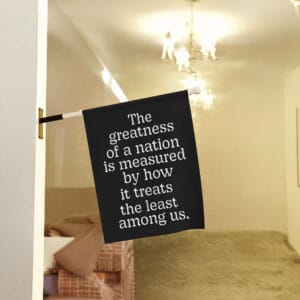 Inspirational-Quote-Garden-Flag,-The-Greatness-of-a-Nation-Flags