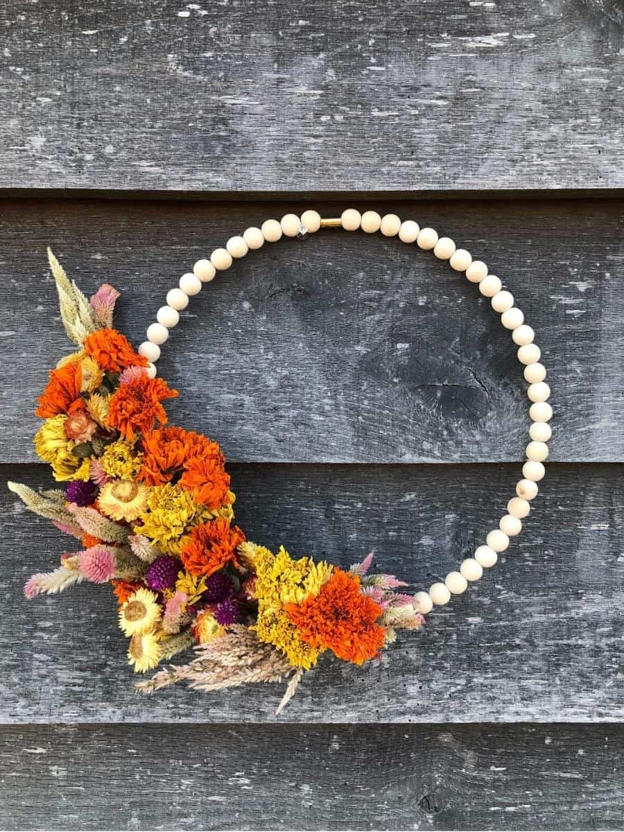 bead wreath with dried mixed florals