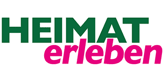 HE_Logo Das Bild zeigt den Text HEIMAT erleben mit HEIMAT in kräftigem Grün und erleben in kräftigem Rosa vor weißem Hintergrund.