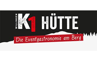 Logo für die K1 Hütte Willingen mit dem Slogan Die Eventgastronomie am Berg auf schwarzem Hintergrund, mit rotem Akzent und der Silhouette eines Berges und von Bäumen.