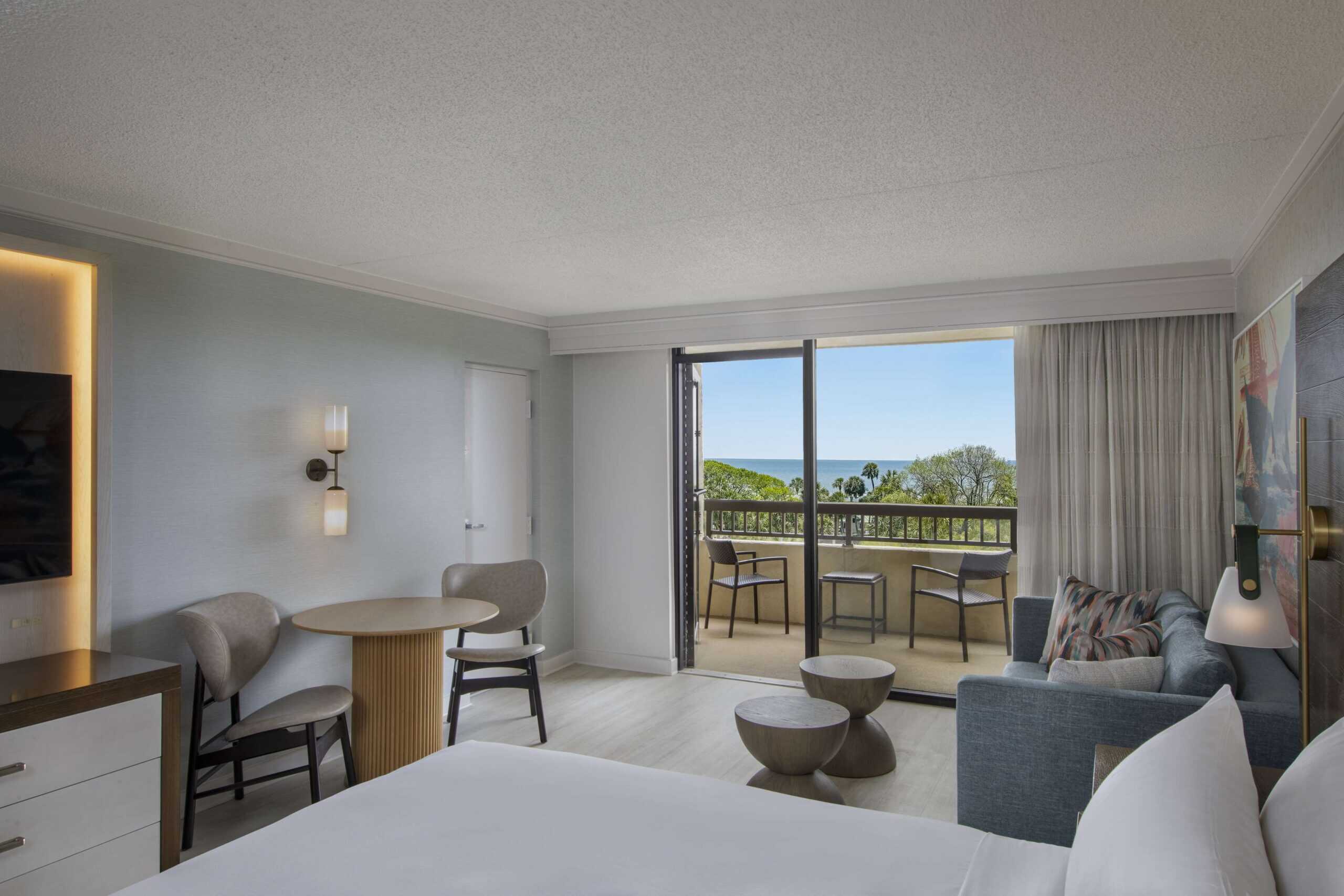 Room with balcony view and decorative accents.