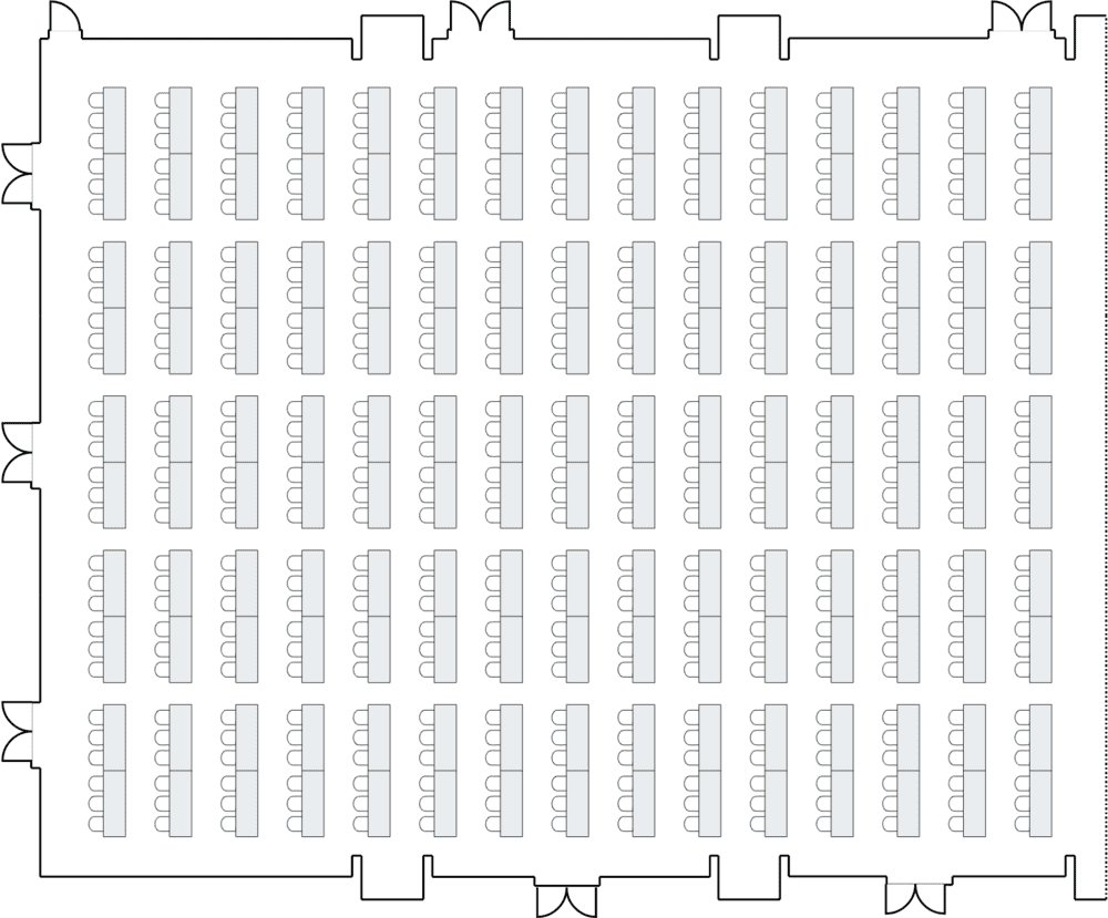 Room layout with rows of rectangular tables.