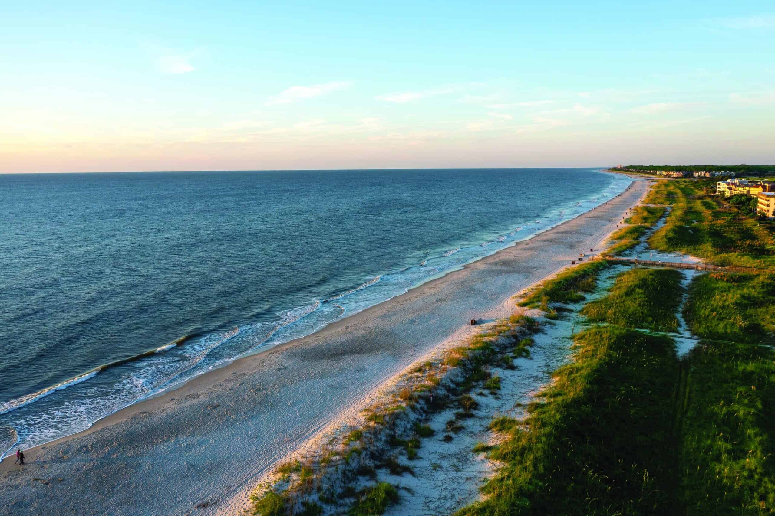Scenic aerial view of a vast sandy beach.