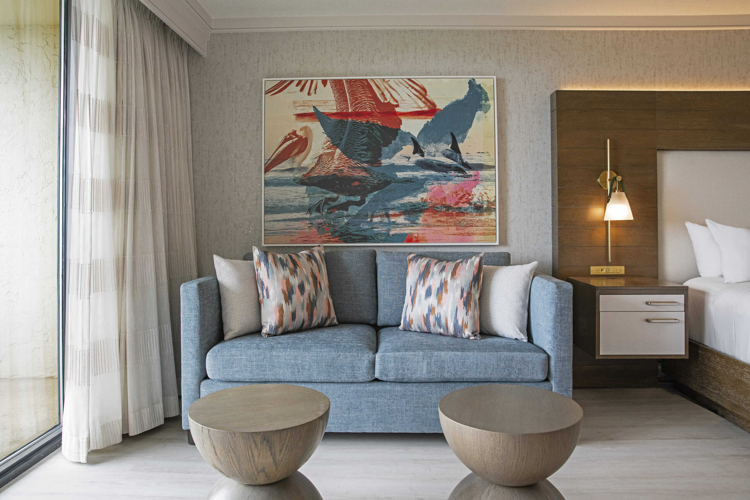 Hotel room living room seating area.
