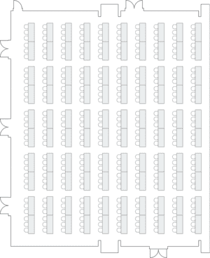 Large hall layout with classroom-style seating arrangement.