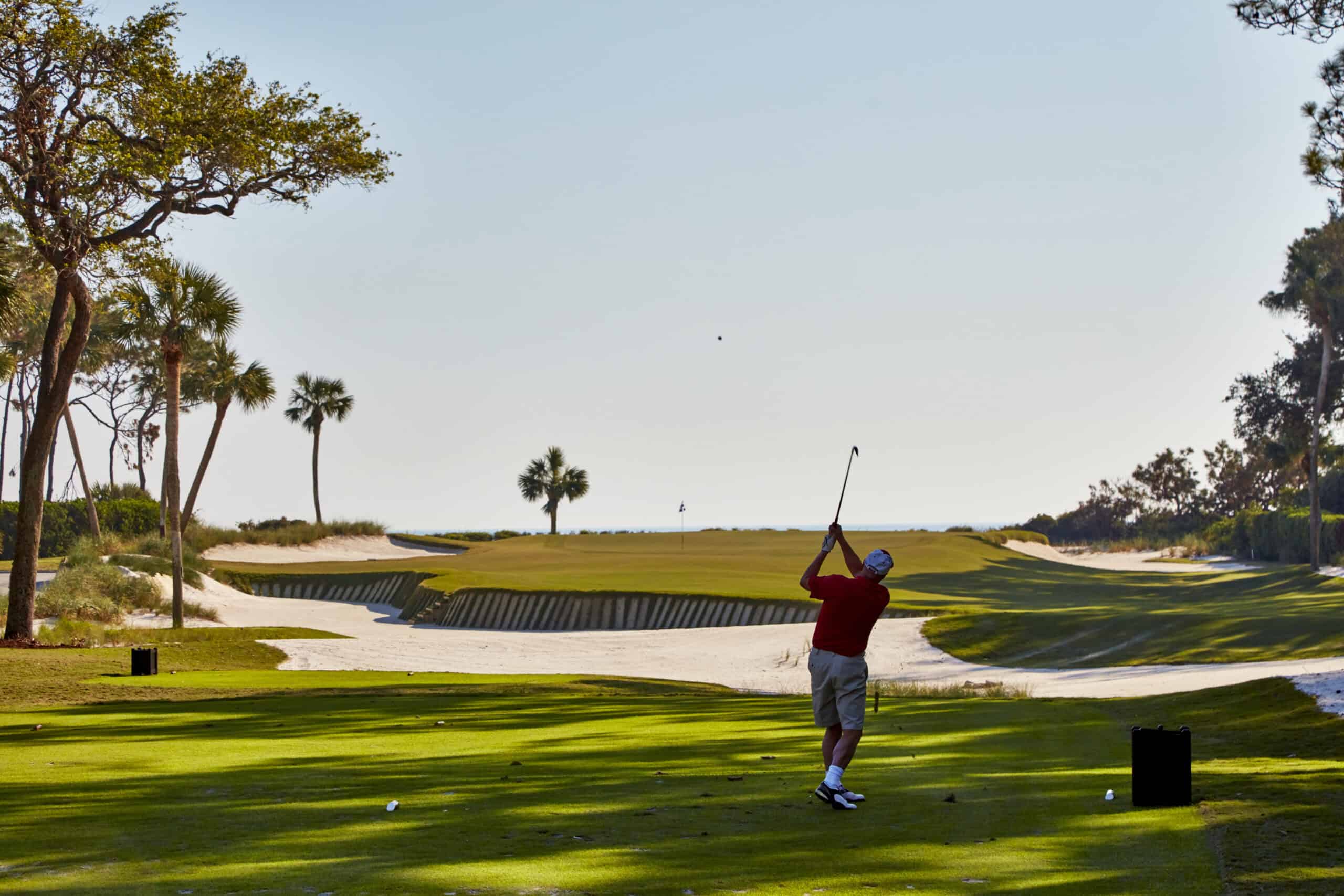 A person playing golf.