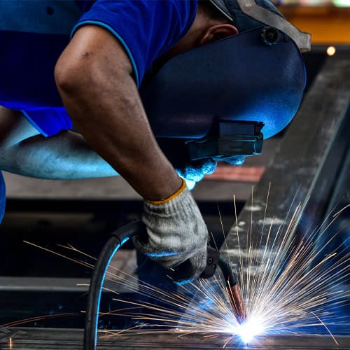 Welding of fabricated metal material by skilled technician.