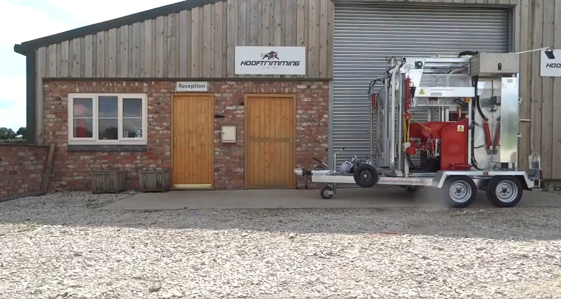 Hooftrimming premises Hoof trimming machine outside brick building