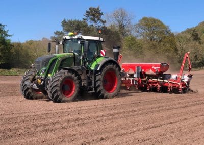 Tractor sowing seeds in a field