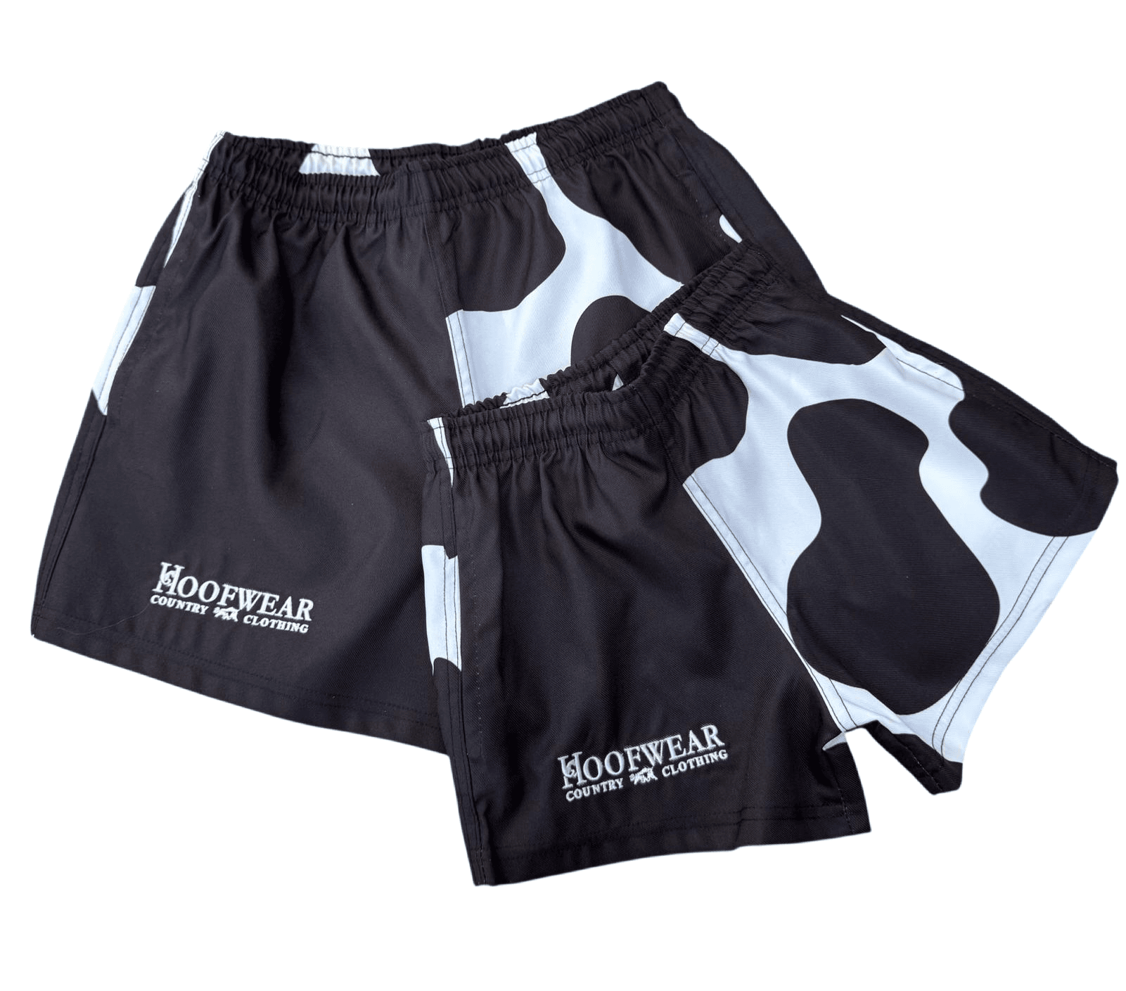 Cow-print shorts by Hoofwear, black and white design.