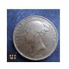 clseup image of a 1954 penny coin showing the obverse bun head side