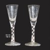 Pair of Twists Glass Studios wine glasses with coloured air twist stems by Michael James Hunter