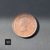Close up of Queen Victoria young head portrait on 1839 quarter farthing coin