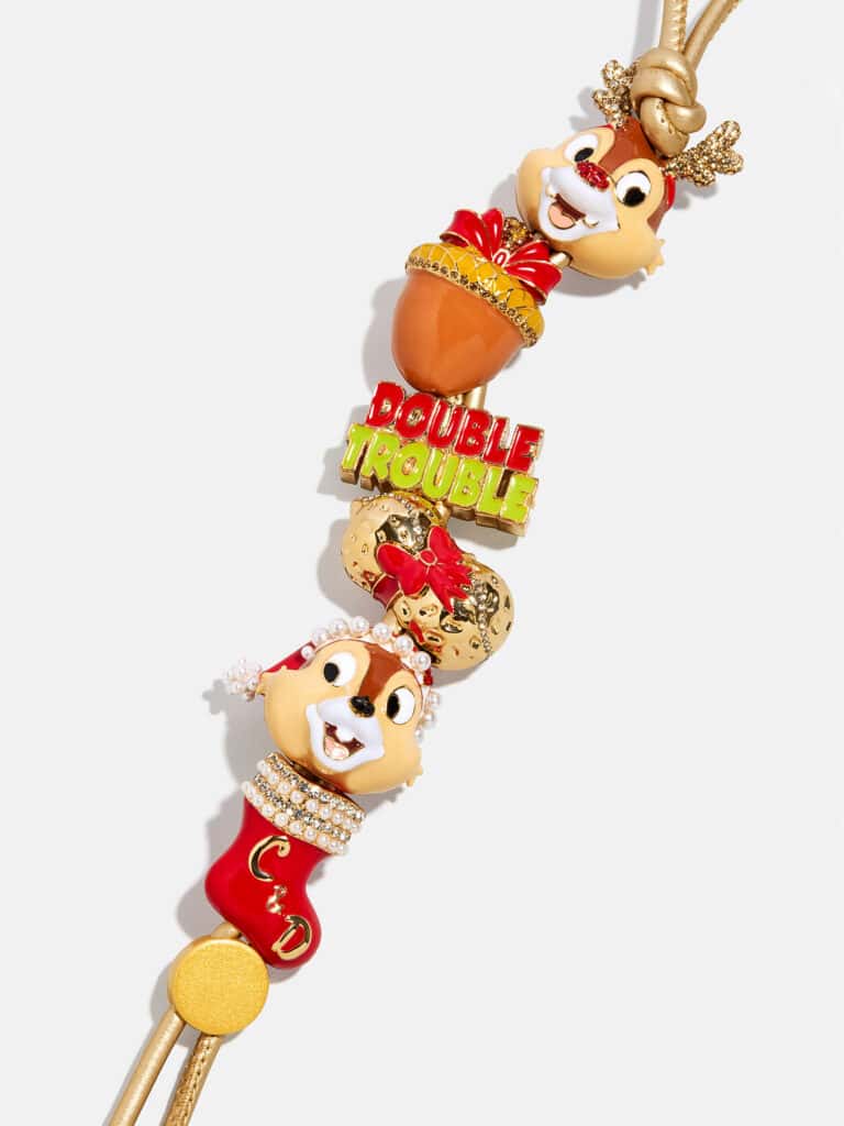 Colorful Disney-themed jewelry with Mickey and Minnie Mouse design elements.