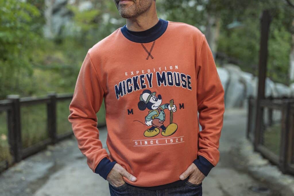 Mickey Mouse sweatshirt with retro Disney design and logo, perfect for Disney fashion enthusiasts.