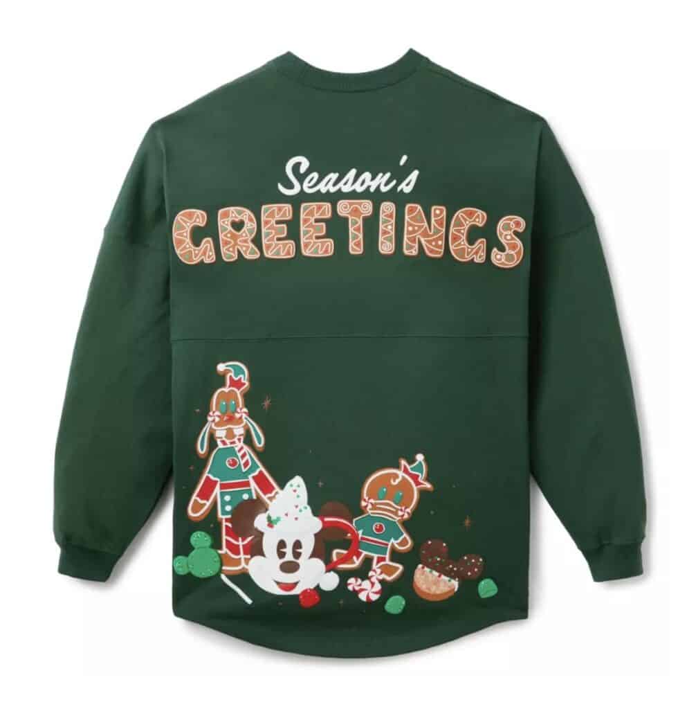 Festive holiday sweatshirt with Disney characters and Christmas-themed designs.