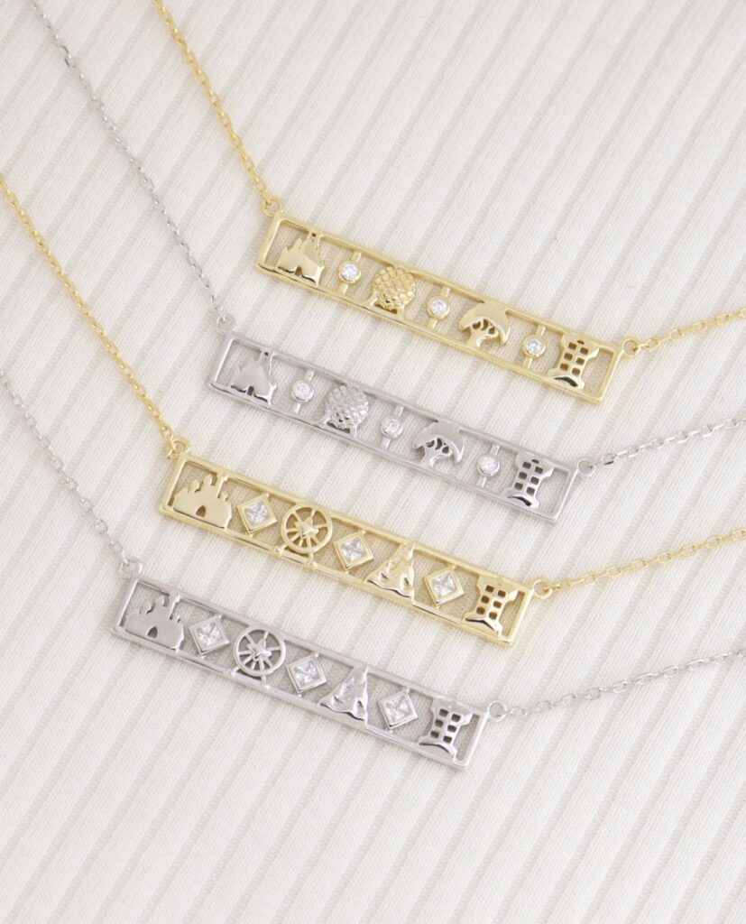 Dainty Disney princess jewelry layered necklaces with charm accents, perfect for Disney fans and Disneybound fashion.