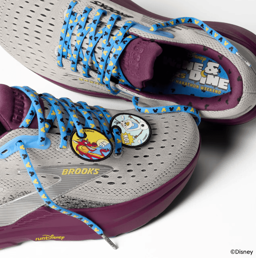 Mickey and Olaf Disney running shoes with colorful laces and character tags.