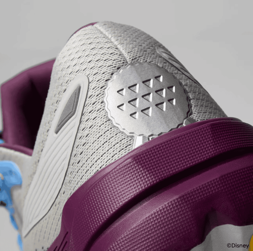 Comfortable athletic sneaker with ergonomic design and colorful accents.