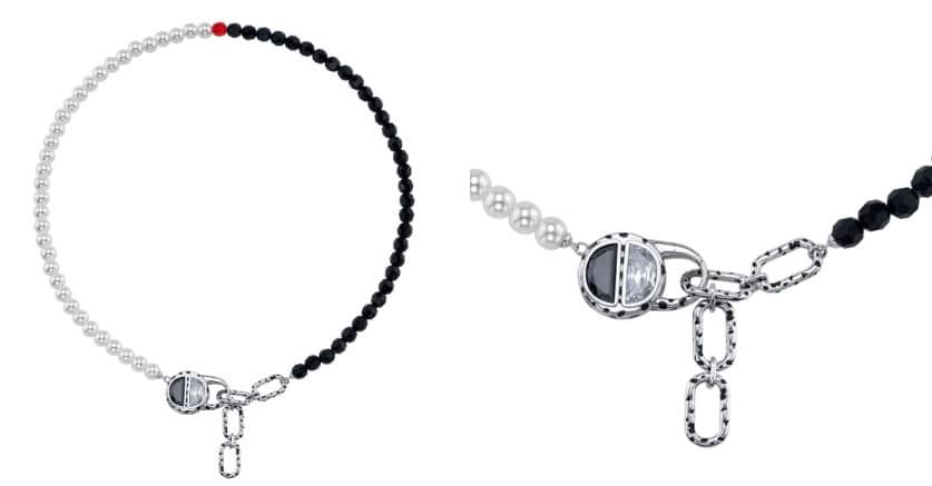 Pearl and black bead statement necklace with silver chain embellishments, Disney-inspired jewelry design.