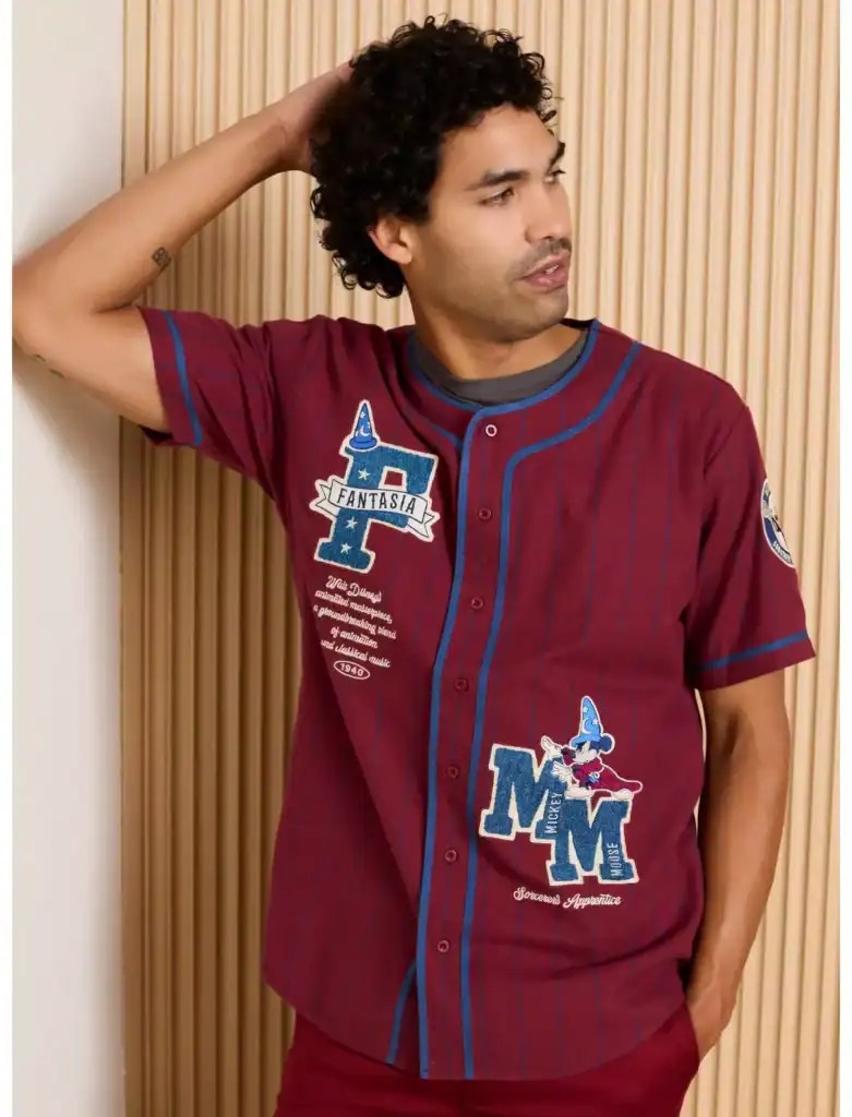 Men’s Disney Mickey Mouse baseball jersey with colorful patchwork design and Disney-themed embroidery.