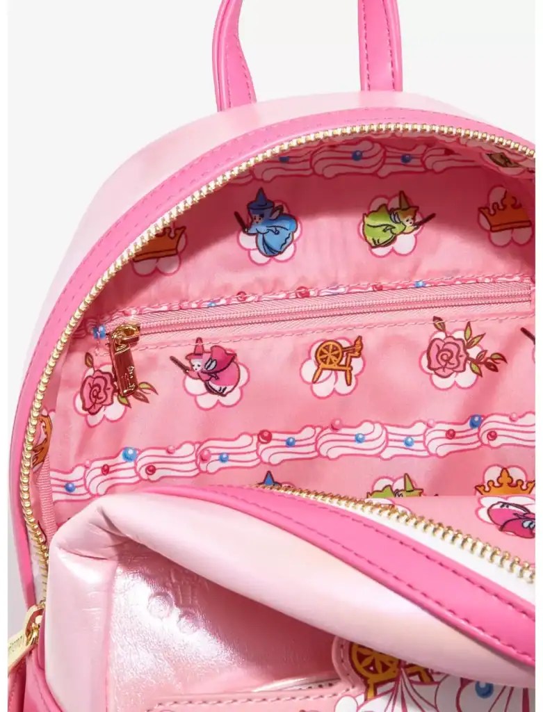 Colorful Disney princess backpack with pink accents and internal themed lining featuring unicorns, crowns, and roses.