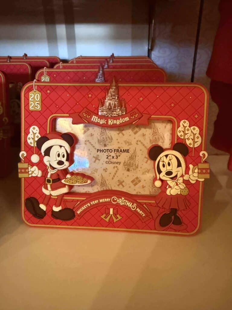 Red Disney Christmas photo frame featuring Mickey and Minnie Mouse at Magic Kingdom, perfect for Disney themed holiday decor.