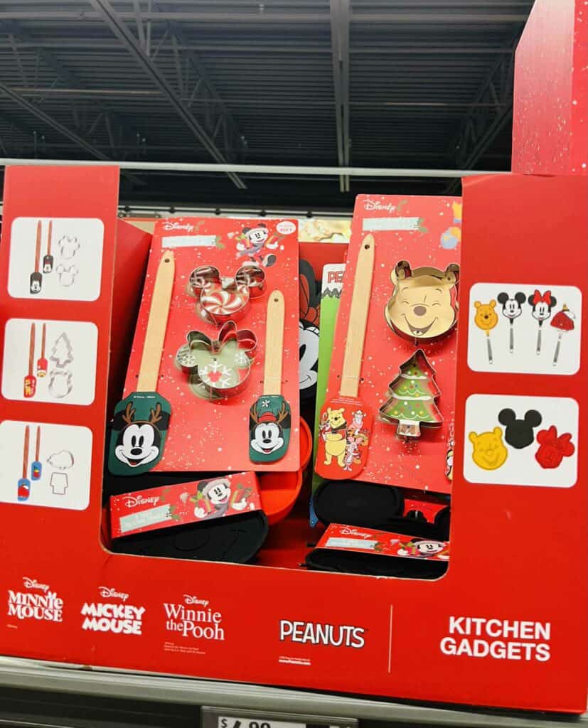 Bright Disney-themed kitchen gadgets featuring Mickey Mouse, Minnie Mouse, Winnie the Pooh, and Peanuts characters for holiday gift ideas.