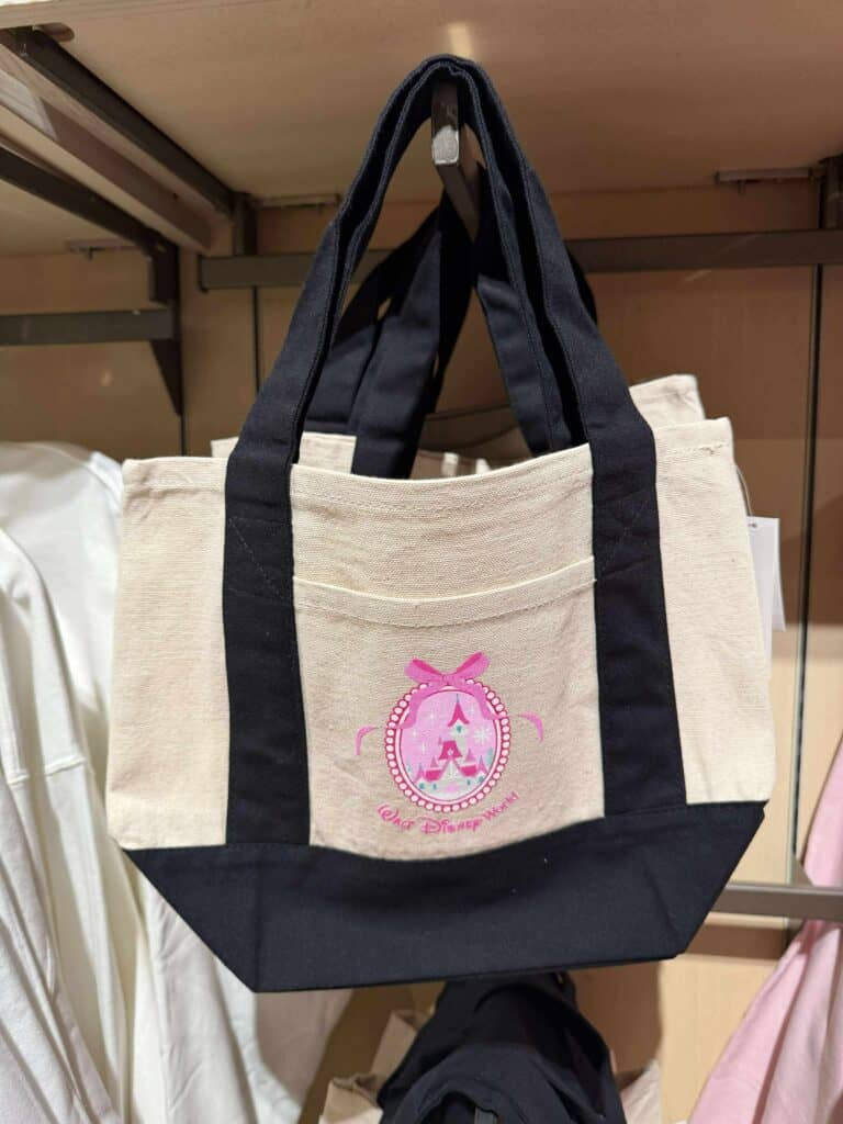 Pink Disney princess tote bag with Eiffel Tower and bow design.
