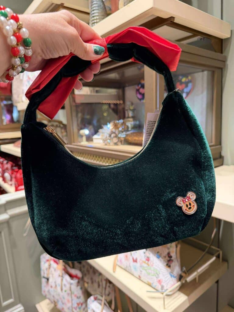 Disney Mickey Mouse velvet handbag with bow detail and plush design, ideal for Disney-enthusiast accessories.