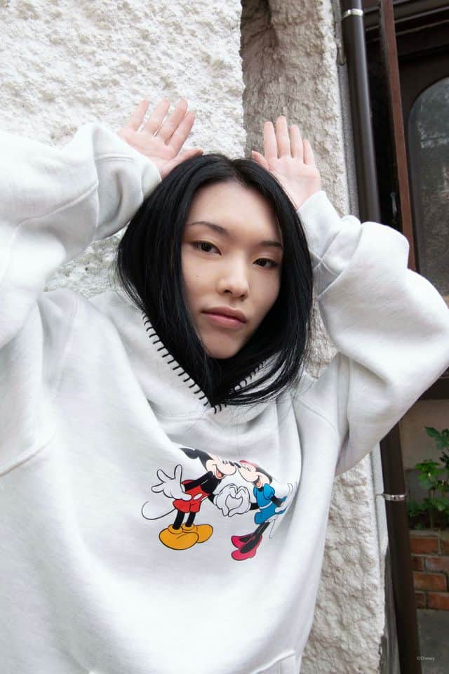 Cute Mickey and Minnie Mouse sweatshirt, casual Disney fashion look.