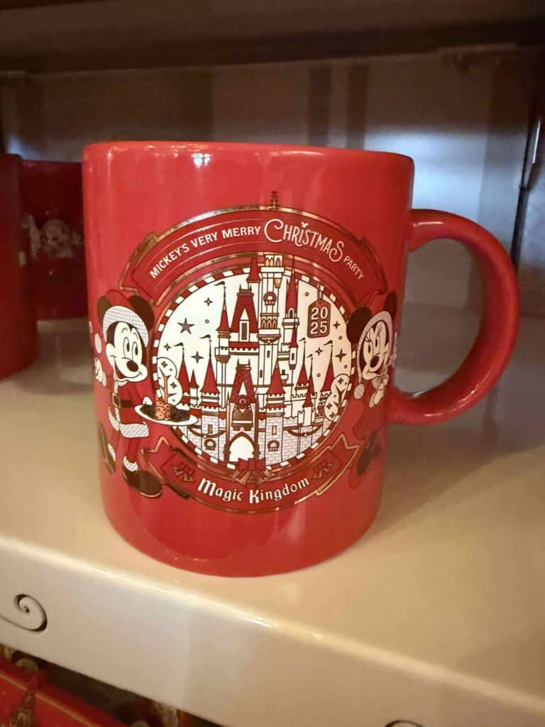Mickey Mouse Christmas mug with Disney themed castle and holiday design, perfect for Disney fans.