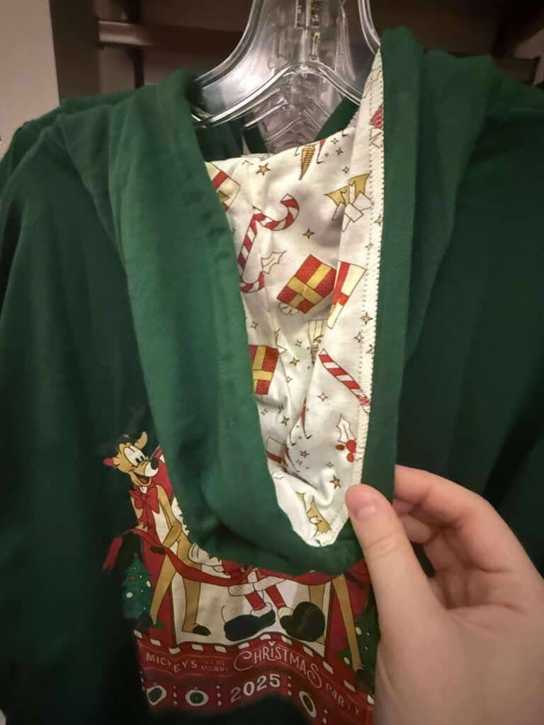 Christmas Disney hoodie with Mickey Mouse and festive holiday print.