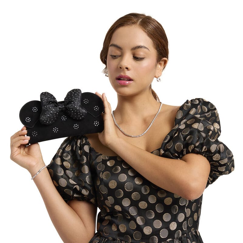 Elegant Disney-inspired black clutch with rhinestone bow detail for stylish Disney fashion.