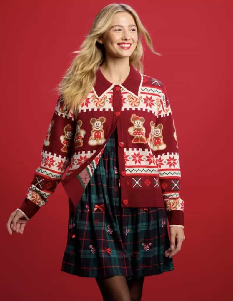 Festive Disney holiday sweater featuring Mickey and Minnie Mouse, perfect for Christmas cheer.