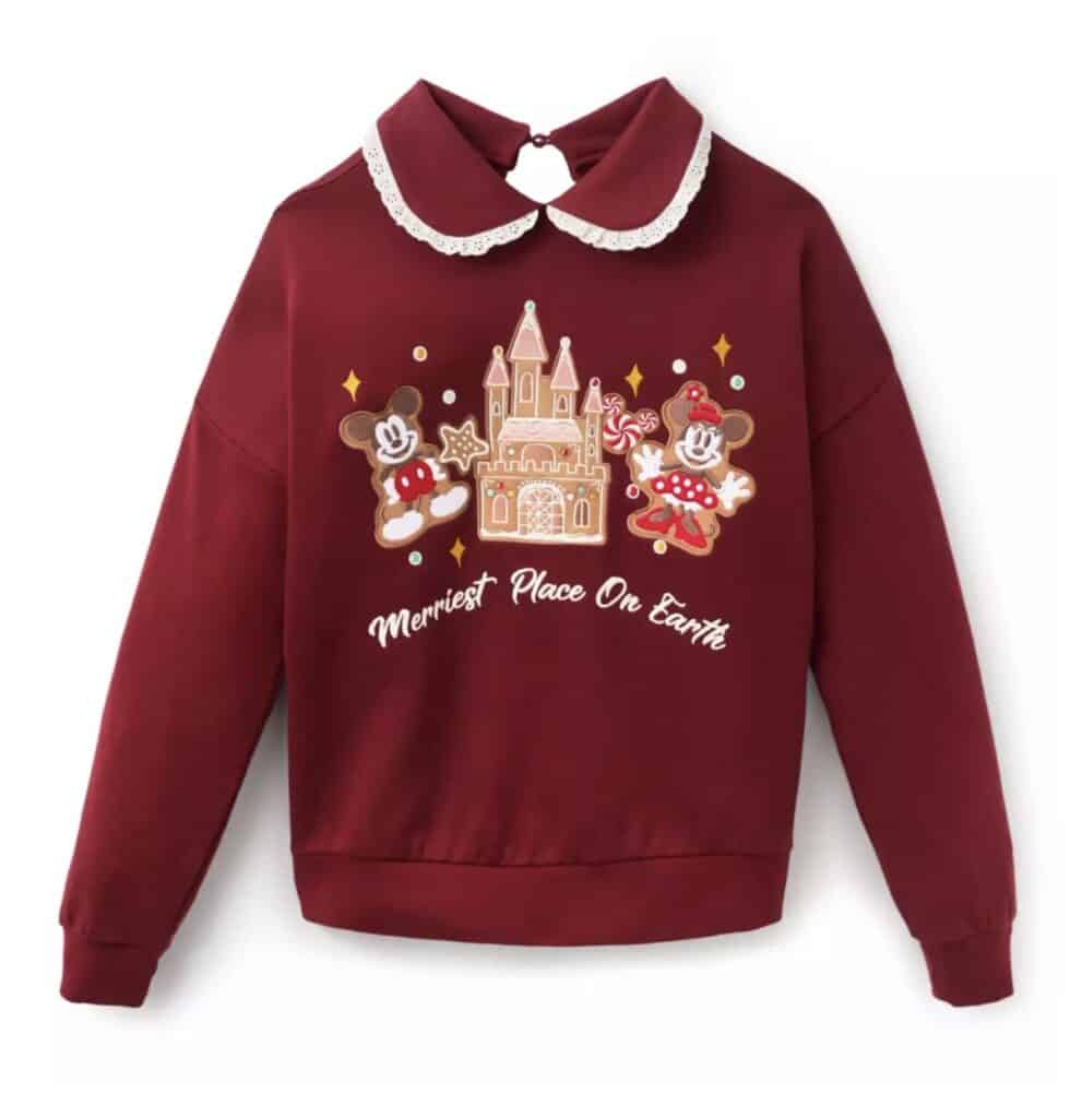 Minnie Mouse and Mickey Mouse holiday sweatshirt with castle and festive design, perfect for Disney Christmas fashion.