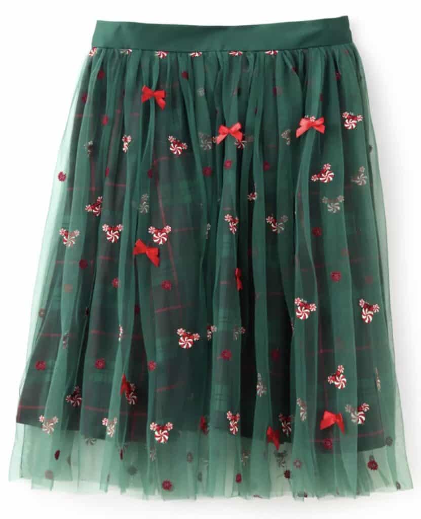 Green holiday tulle skirt with red bow and peppermint candy embroidery, perfect for Disney-inspired festive fashion.