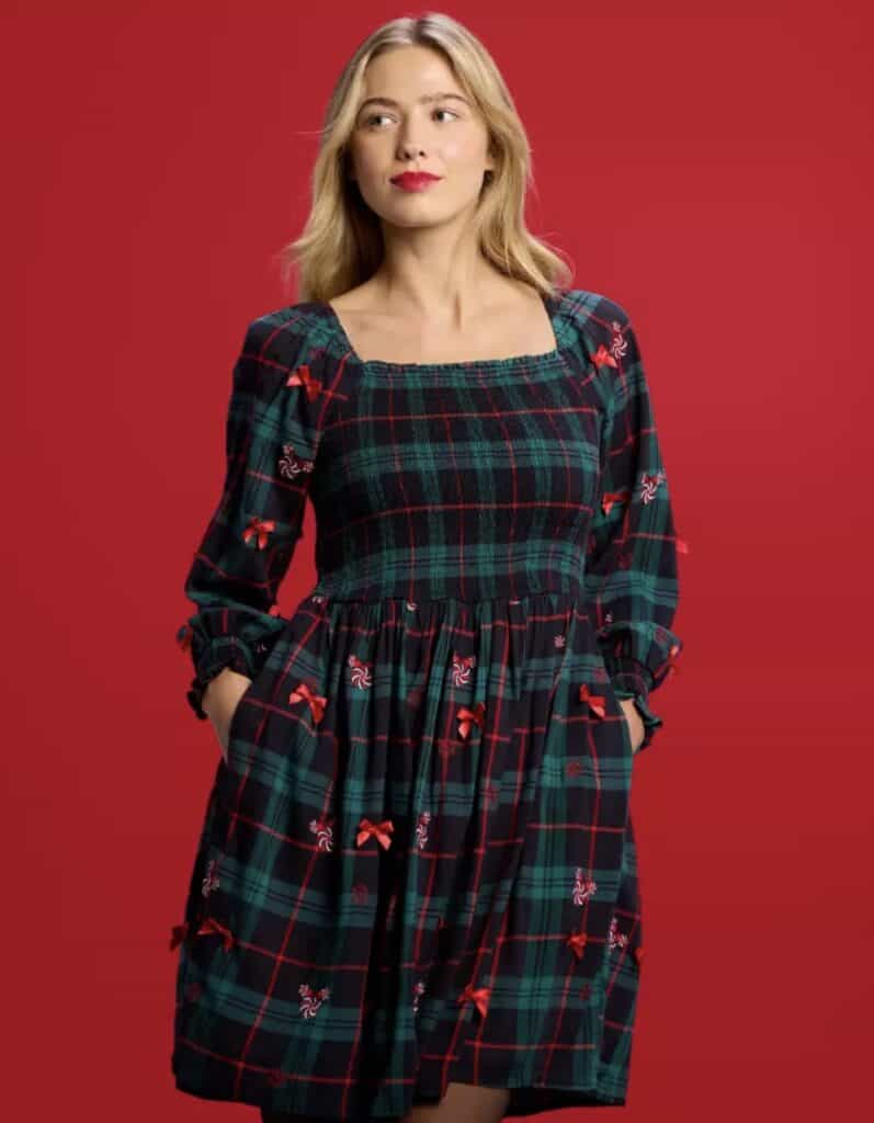 Festive plaid dress for women with Christmas holiday theme and red bows.