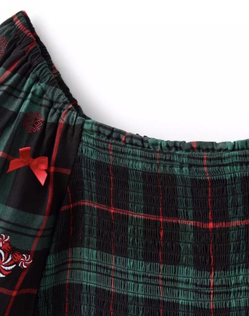 Plaid pajama pants with red bow and embroidered snowflake, cozy holiday sleepwear for women.