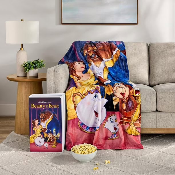 Enchanting Disney Beauty and the Beast blanket with beloved characters for cozy movie nights.