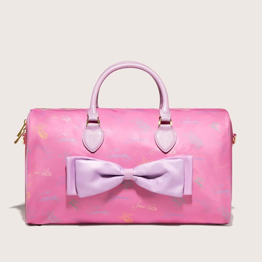Pink Disney Cinderella-inspired travel bag with bow accent, ideal for Disney fans and princess lovers.