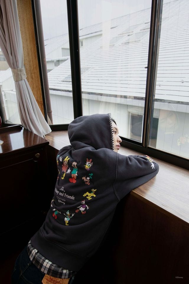 Comfortable Disney-themed hoodie with classic characters.