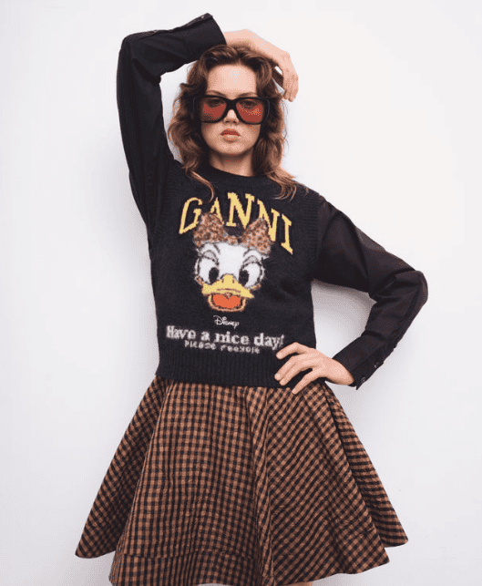 Colorful Disney-themed sweatshirt featuring Daisy Duck, perfect for Disney fashion lovers and casual Disney apparel.