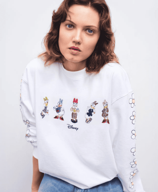 Disney sweatshirt featuring classic Disney characters and floral sleeve designs, perfect for Disney fashion lovers.